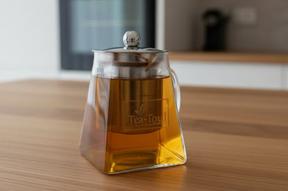 Loose-leaf teapot on a wooden countertop